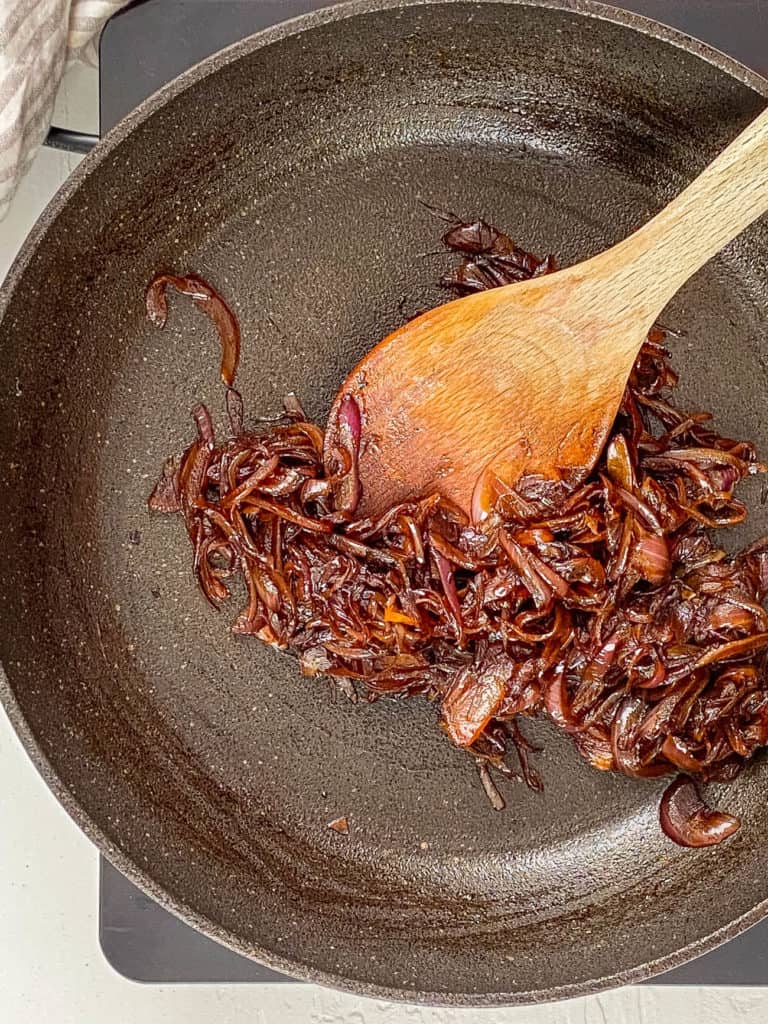 caramelized onions sauteeing in a pan