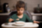 A boy eating cereal