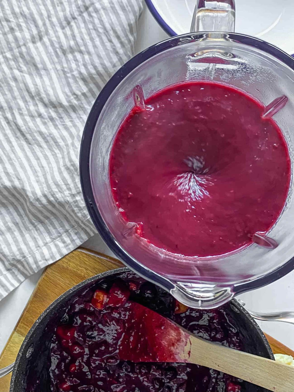 Blueberry baby food in a blender.