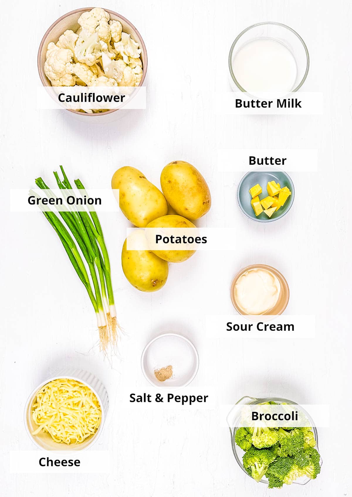 Ingredients for healthy baked potatoes recipe on a white background.